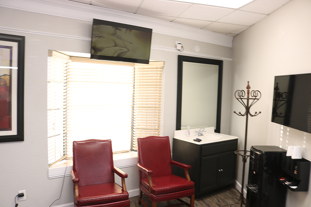 Braider chair rental station at Bladez Barber and Braiding Fort Worth